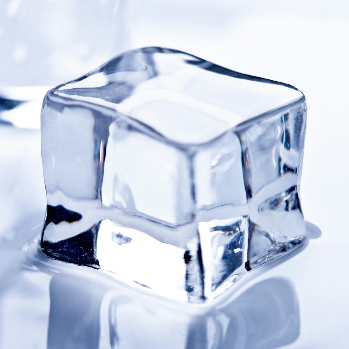 An ice cube sitting on top of a table